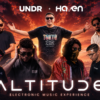 Promotional poster for ALTITUDE electronic music event with seven DJs posing against a fiery sunset and city skyline.